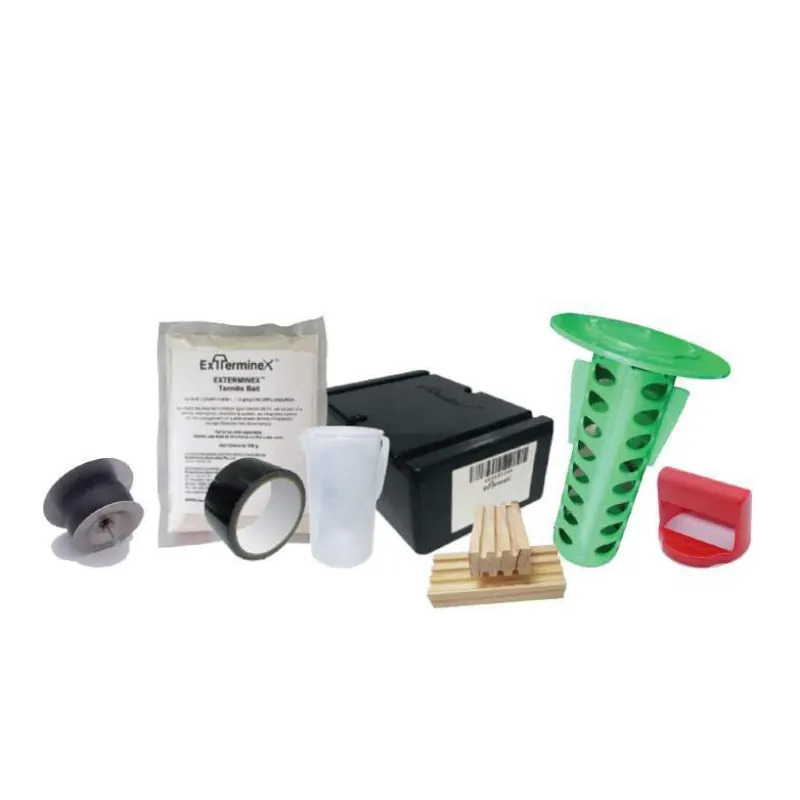 Exterminex kit components: bait pack, in-ground station, cap and monitoring timber